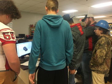 Students learning about additive manufacturing design