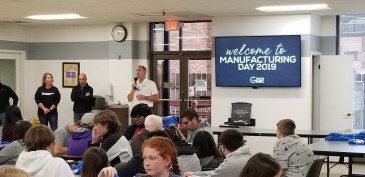 Mark Chalfant, Fuller Brush CEO, talks with students