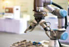 Robotic arm working on manufacturing floor